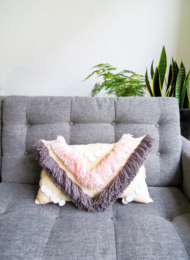 fringe pillow - DIY Yarn Fringe Throw Pillow by top Houston lifestyle blogger Ashley Rose of Sugar and Cloth