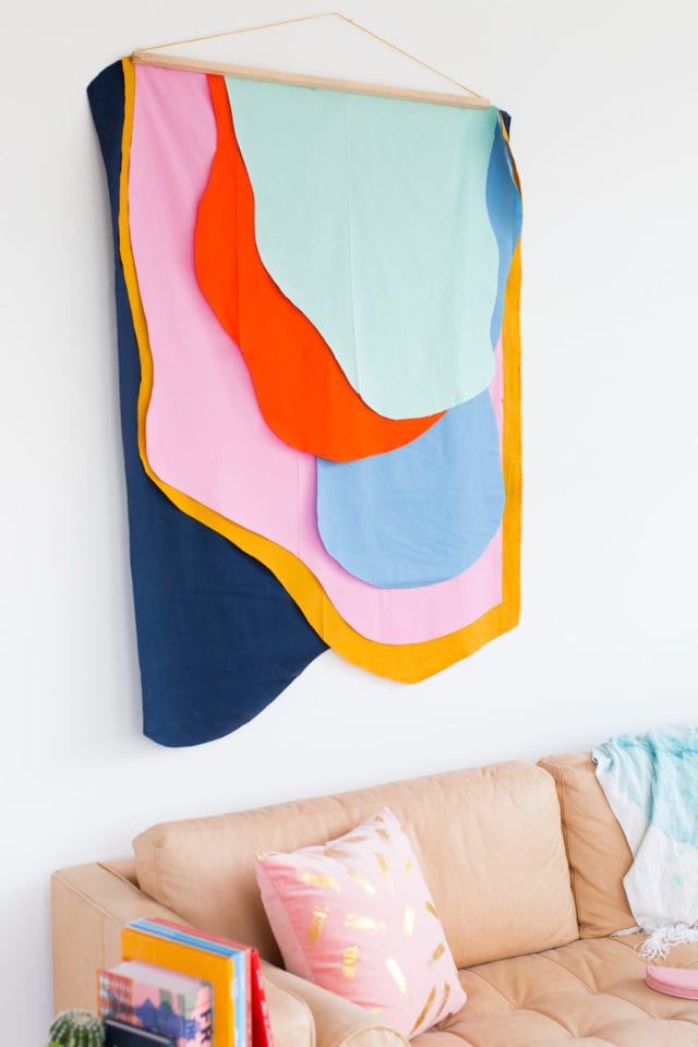 Colorful DIY Fabric Wall Hanging by top Houston lifestyle blogger Ashley Rose of Sugar and Cloth