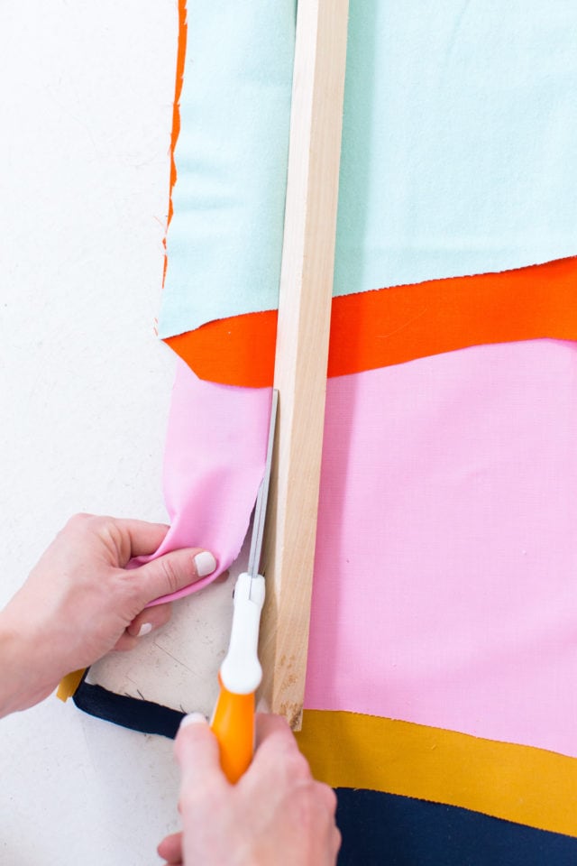 Colorful DIY Fabric Wall Hanging by top Houston lifestyle blogger Ashley Rose of Sugar and Cloth