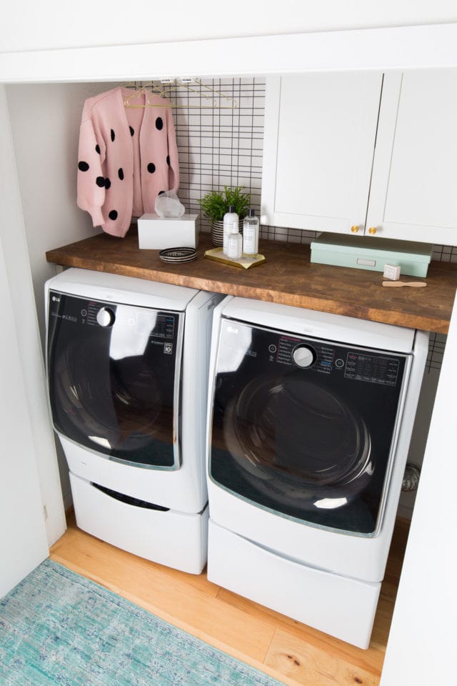 Big Reveal: Before & After of our Laundry Room Makeover + 2 Minute DIY Dryer Sheet Dispenser by top Houston lifestyle blogger Ashley Rose of Sugar & Cloth