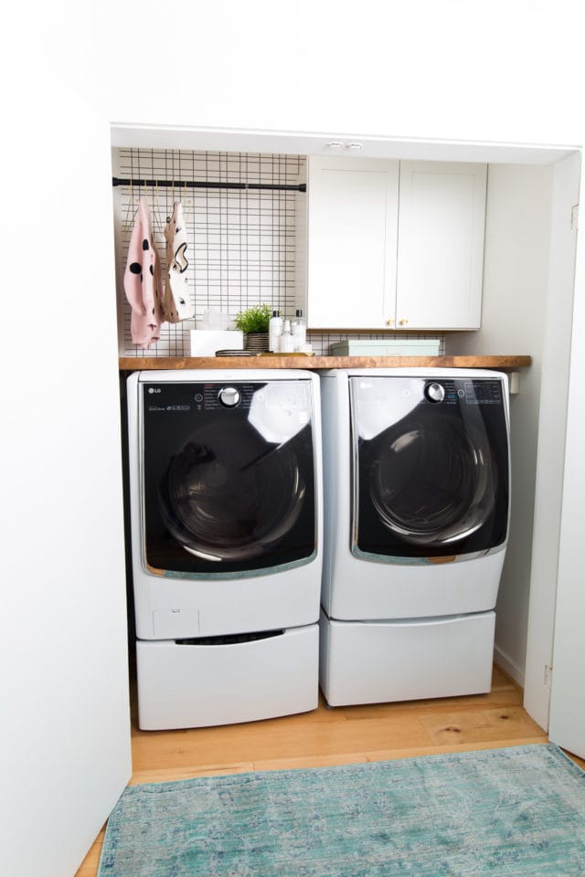 Big Reveal: Before & After of our Laundry Room Makeover + 2 Minute DIY Dryer Sheet Dispenser by top Houston lifestyle blogger Ashley Rose of Sugar & Cloth