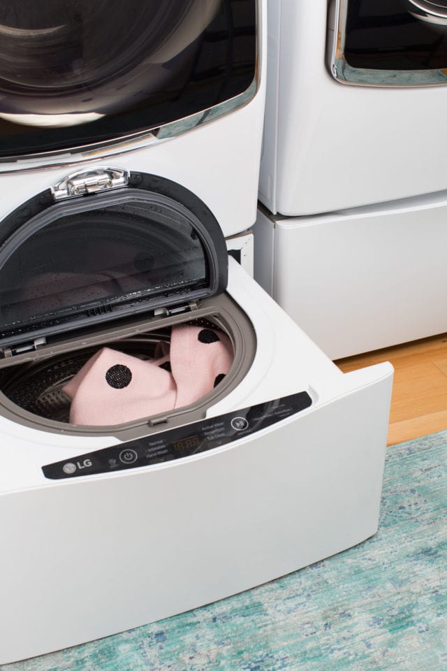 Big Reveal: Before & After of our Laundry Room Makeover + 2 Minute DIY Dryer Sheet Dispenser by top Houston lifestyle blogger Ashley Rose of Sugar & Cloth