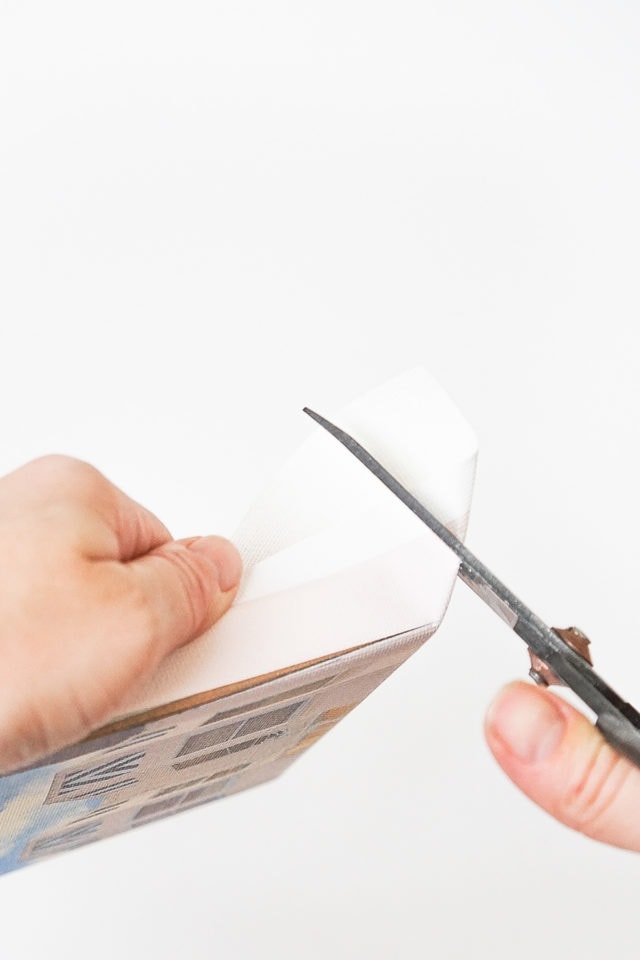 photo of how to trim any access canvas paper by top Houston lifestyle blogger Ashley Rose of Sugar & Cloth