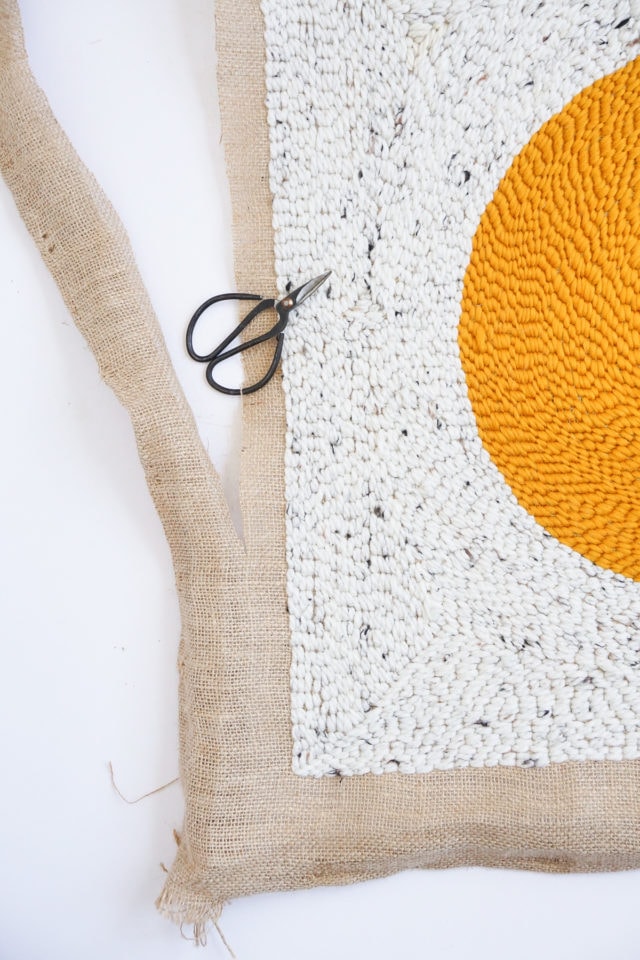 Step 9- DIY Rug Hook Pillow by top Houston lifestyle blogger Ashley Rose of Sugar and Cloth #rughook #diy #poillow #craft #diypillow #doityourself #pillowcase #homedecor #diydecor