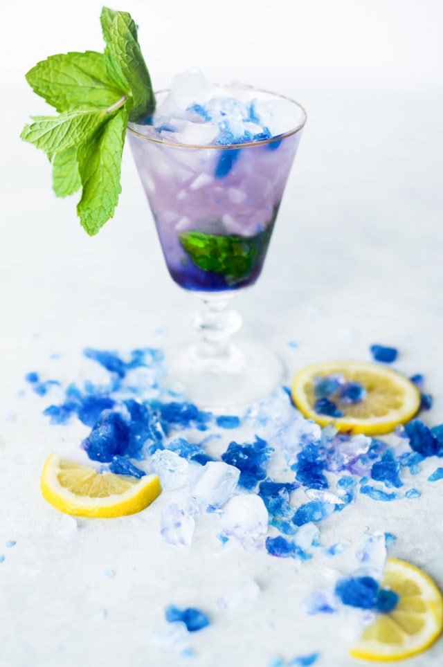 photo of a mood ring color changing galaxy cocktail by top Houston lifestyle blogger Ashley Rose of Sugar & Cloth