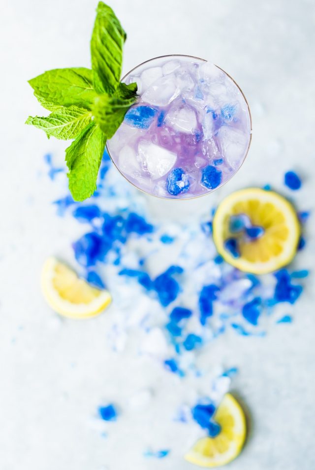 photo of the Butterfly Pea Flower Tea Cocktail from above by top Houston lifestyle blogger Ashley Rose of Sugar & Cloth