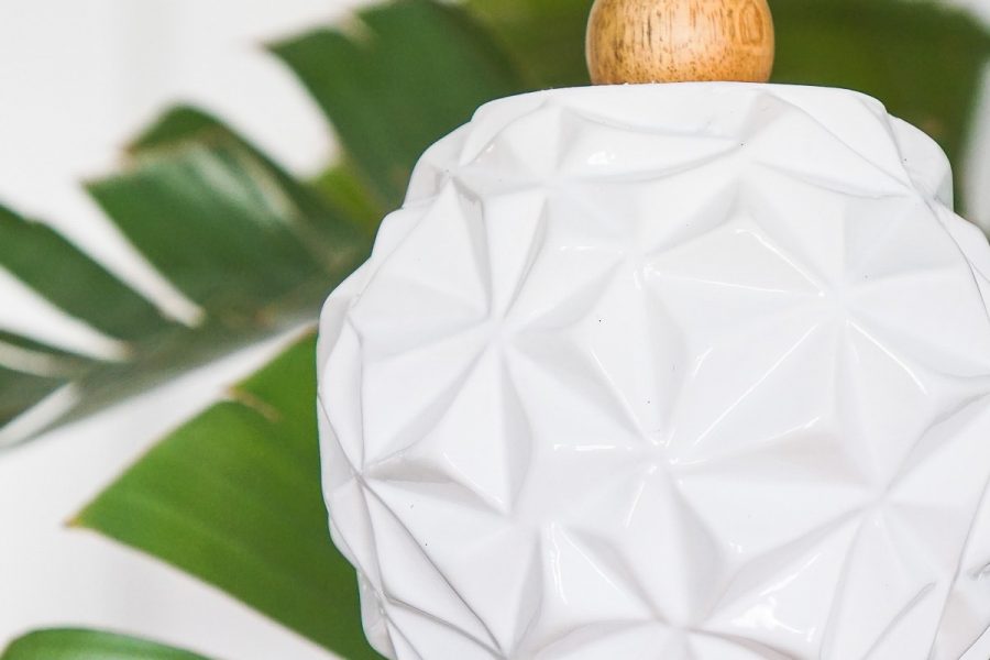 photo of a white vase turned into a DIY wind chime