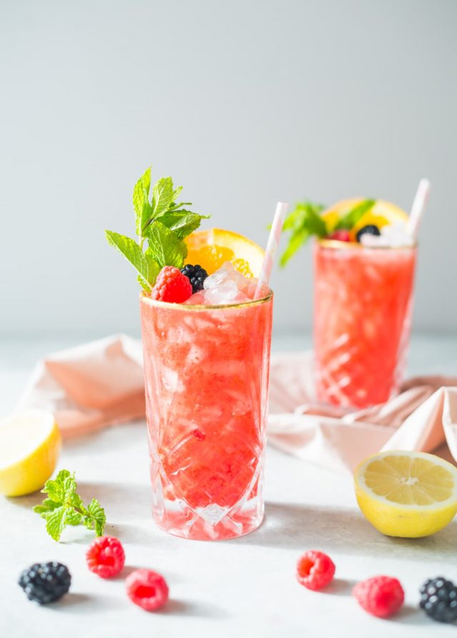 picture of two styled sherry berry cocktails by sugar and cloth