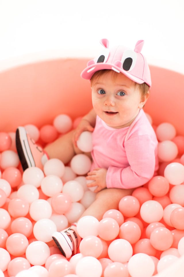 Gwen in her cute pink felt ball pit! -- loading up the crazy amount of baby gear! Our Family DIY Hungry Hippos Costume Idea -- by Top Houston blogger Ashley Rose of Sugar and Cloth -- #costumes #halloween #ideas #family #familycostume #diy
