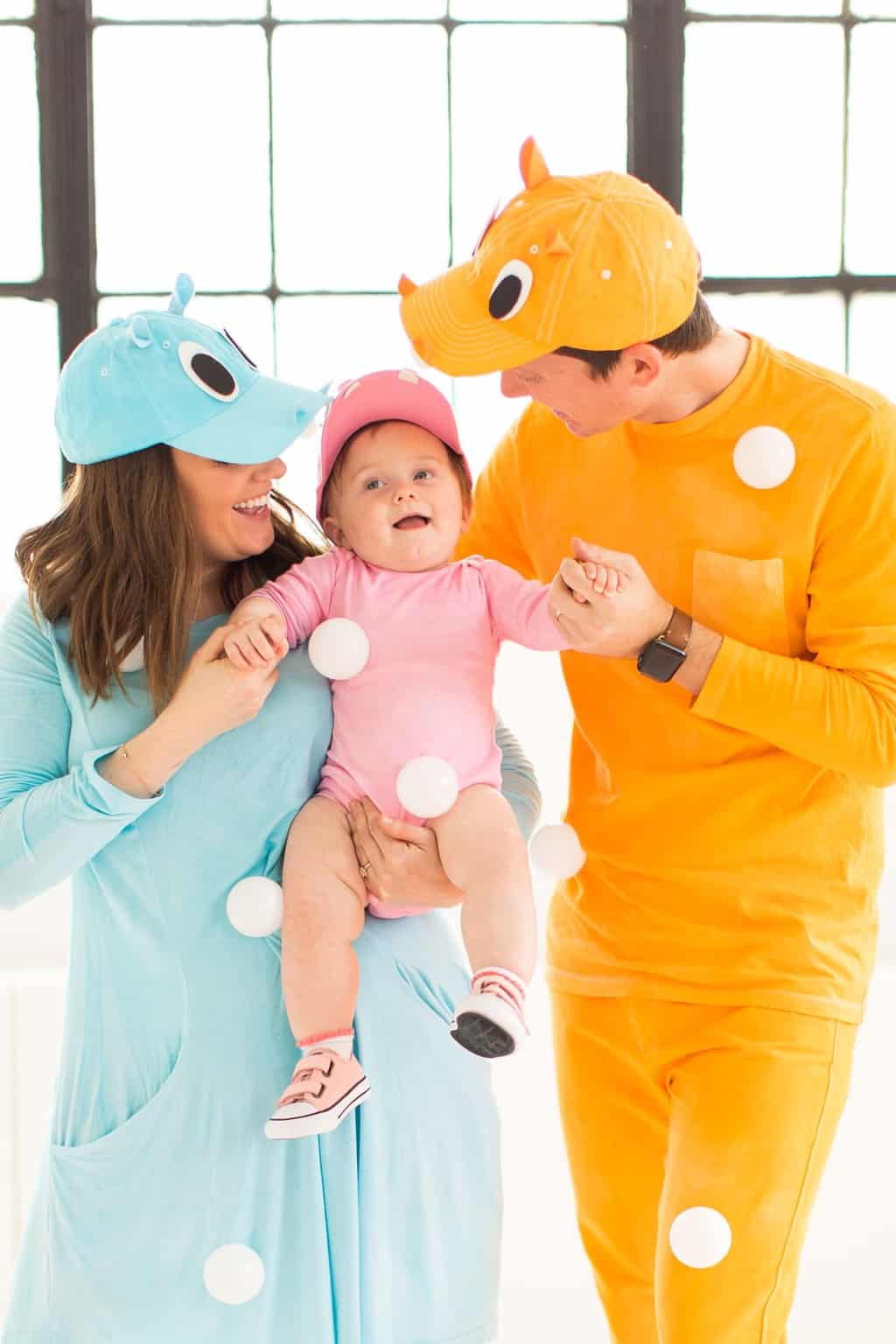 photo of the family in their costumes inspired by the hungry hippo game