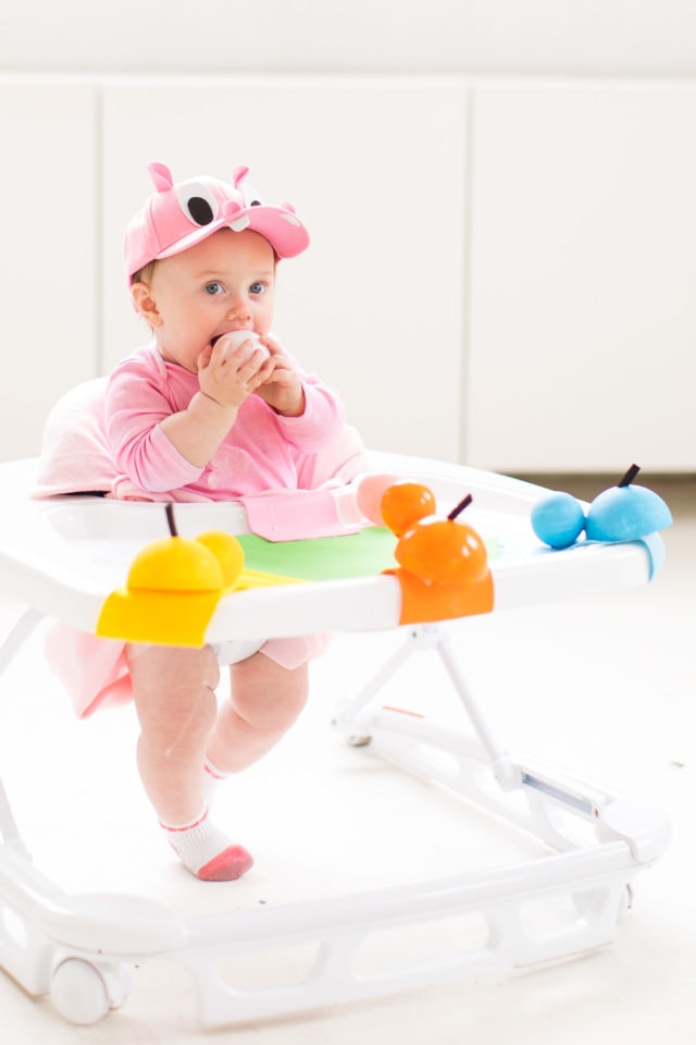 and of course we had to turn her walker into the hippo game! -- loading up the crazy amount of baby gear! Our Family DIY Hungry Hippos Costume Idea -- by Top Houston blogger Ashley Rose of Sugar and Cloth -- #costumes #halloween #ideas #family #familycostume #diy