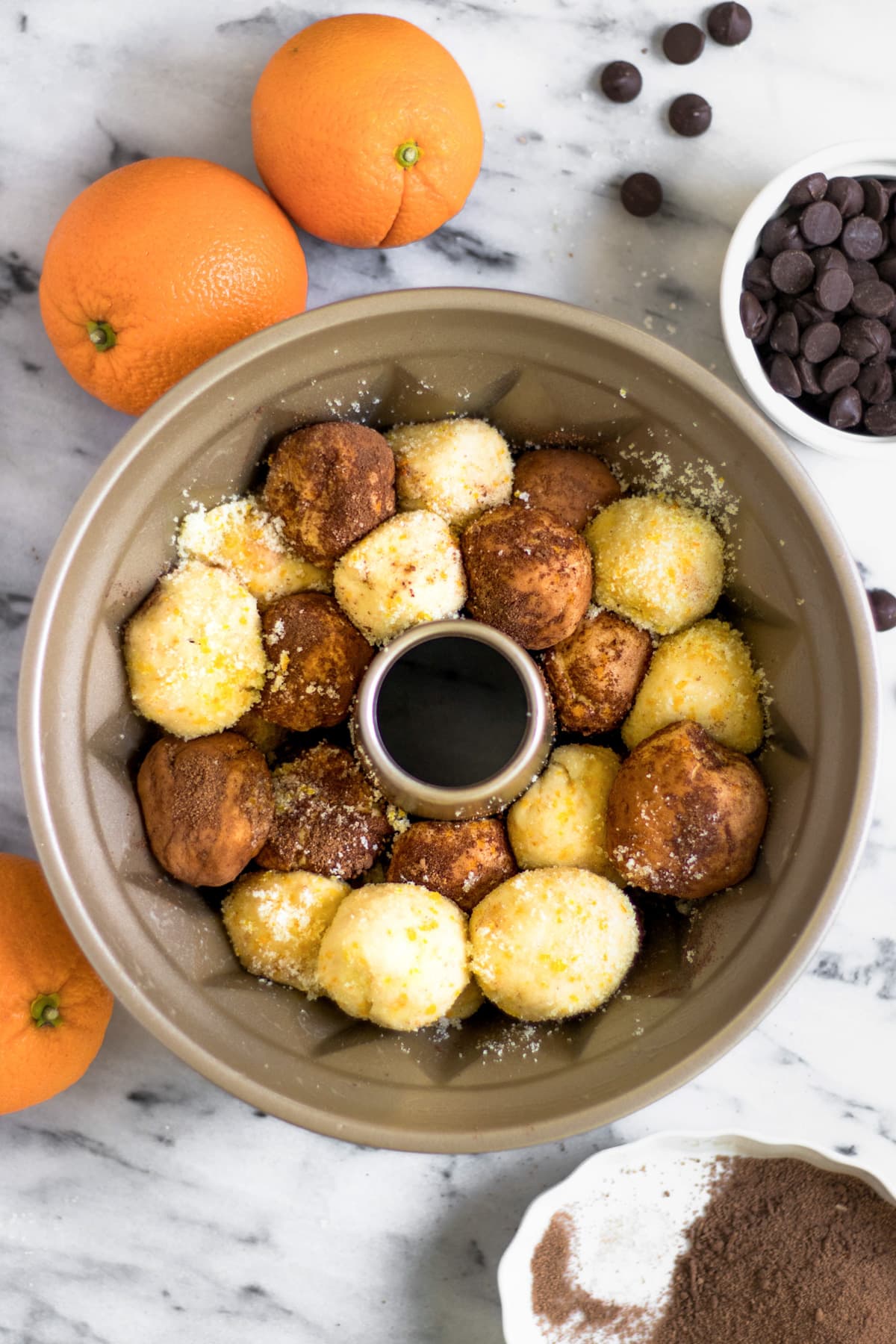 overnight prep for an easy monkey bread recipe with chocolate and orange flavors (or whatever floats your boat!) for the holidays! by top Houston lifestyle blogger Ashley Rose of Sugar & Cloth - #recipe #easy #christmas #holidays #quickrecipes #easyrecipe #holiday #winter