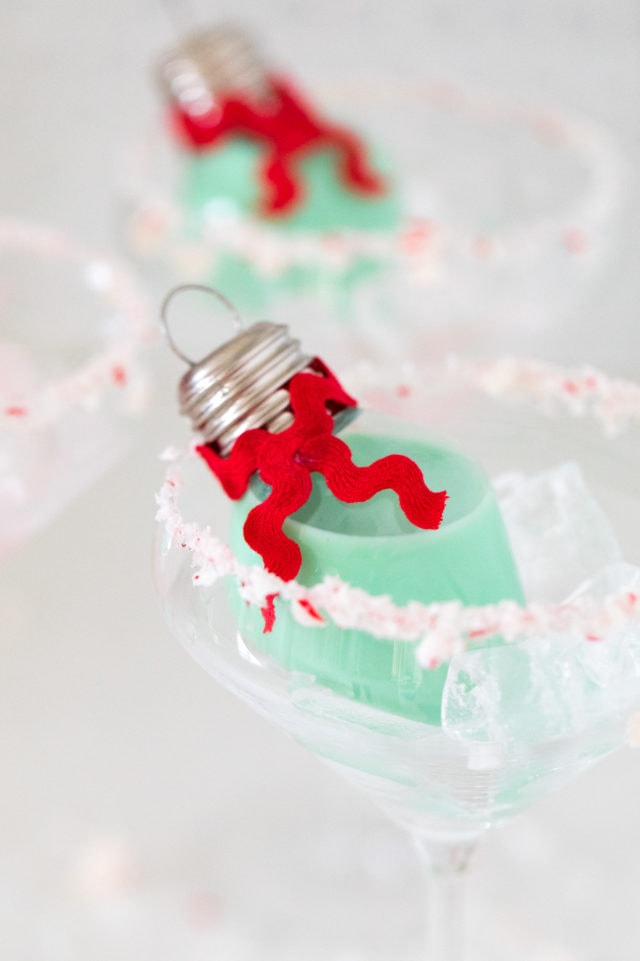 mint green cocktails! How to Make an Easy Christmas Cocktails in Ornaments by top Houston lifestyle blogger Ashley Rose of Sugar & Cloth #christmas #cocktail #easy #ideas #holidays #winter #ornament #decor #recipe