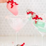 pink and mint green cocktails with rumchata - Pour your own ornament holiday cocktail! How to Make an Easy Christmas Cocktail Ornament by top Houston lifestyle blogger Ashley Rose of Sugar & Cloth #christmas #cocktail #easy #ideas #holidays #winter #ornament #decor #recipe