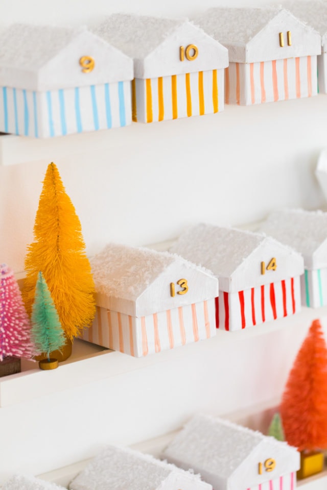 striped Christmas houses! Colorful Houses DIY Advent Calendar by top Houston lifesyle blogger Ashley Rose of Sugar and Cloth #diy #christmas #advent #holiday #decor #idea #howto #kids #crafts
