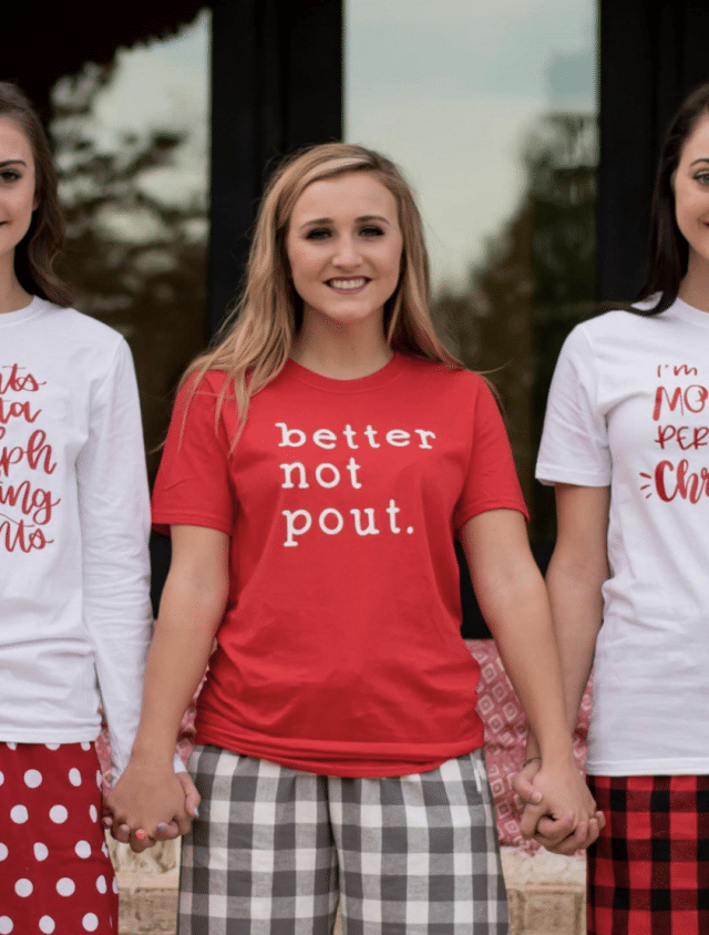 girl wearing a better not pout tshirt and holding hands with family