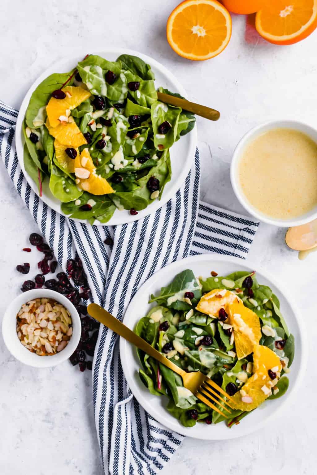 the perfect salad! A Cranberry Orange Salad with Creamy Citrus Vinaigrette by top Houston lifestyle blogger Ashley Rose of Sugar & Cloth