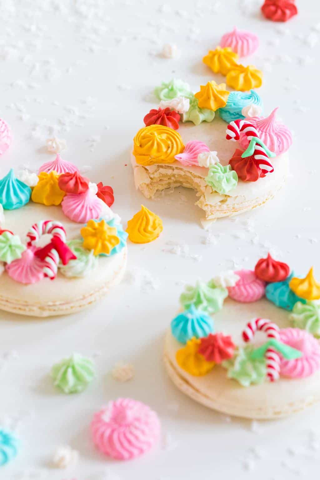 colorful holiday cookies - How to Make Holiday Wreath Meringue Macarons by top Houston lifestyle blogger Ashley Rose of Sugar & Cloth #holiday #cookies #meringues #wreath #christmas #ideas