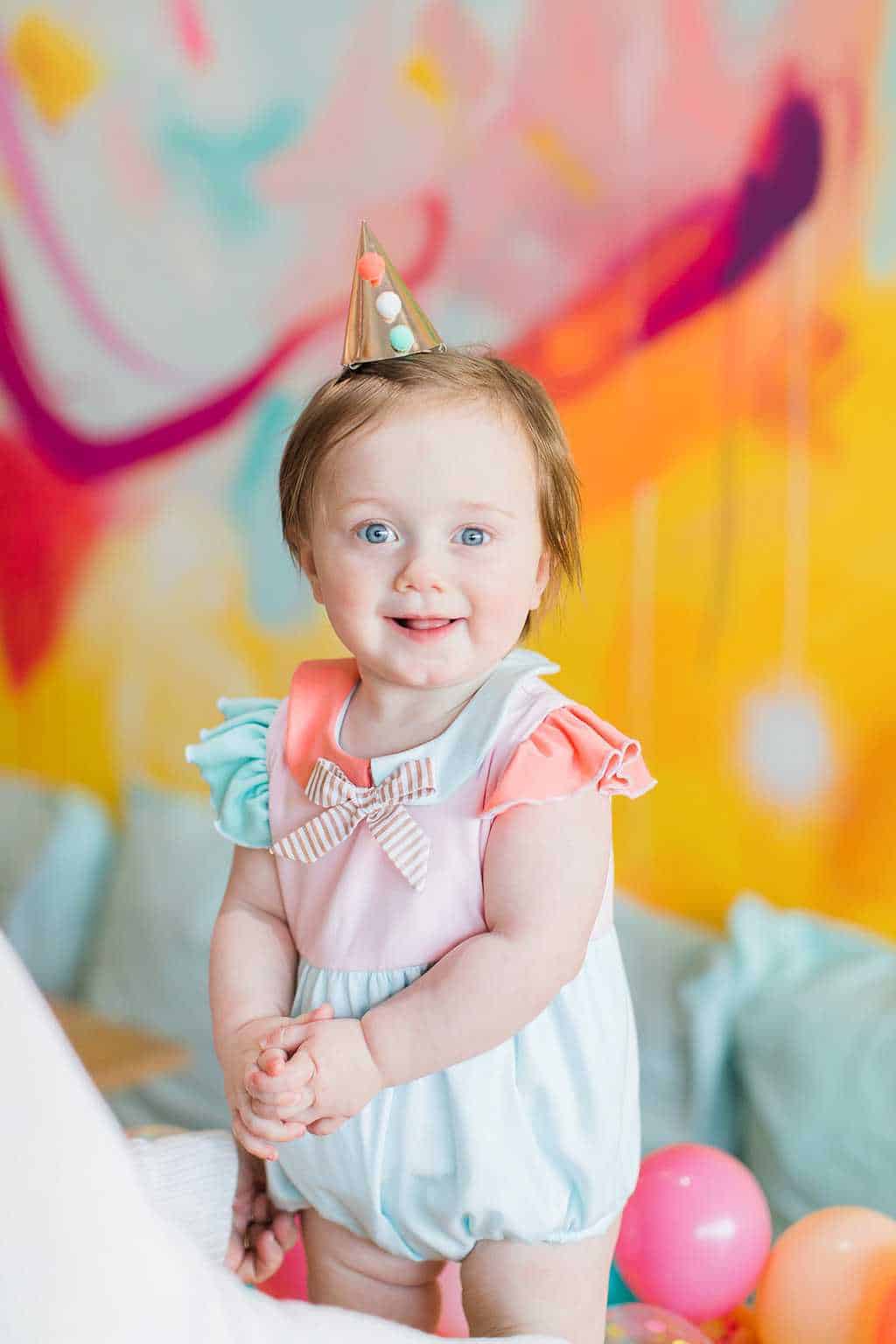 happy birthday to our sweet girl! - Gwen Turns One + Her First Birthday Party Ideas! by top Houston Lifestyle Blogger Ashley Rose of Sugar & Cloth #party #partyideas #firstbirthday #baby #birthday #howto #diy #budget #colorful