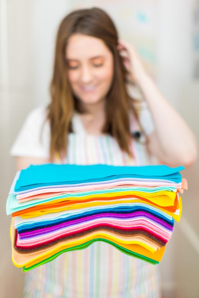 color coded felt sheets - A Peek Inside My New Studio & Craft Closet by top Houston lifestyle blogger Ashley Rose of Sugar & Cloth #design #organizing #interiors #craft #craftroom 