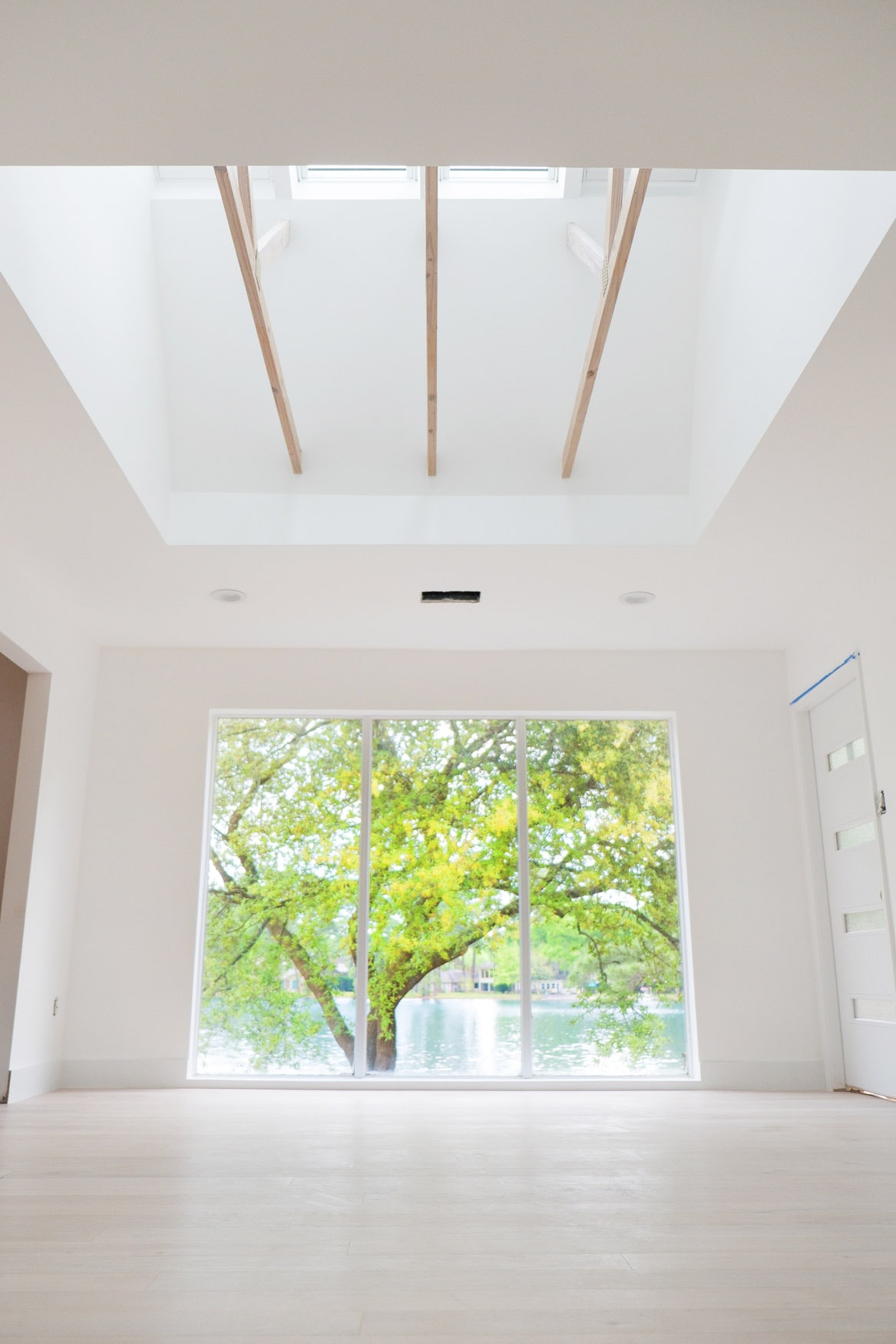 An upward angle on our new master bedroom with Velux skylights - Sugar & Cloth Casa: Before & After of Installing Skylights in The New House