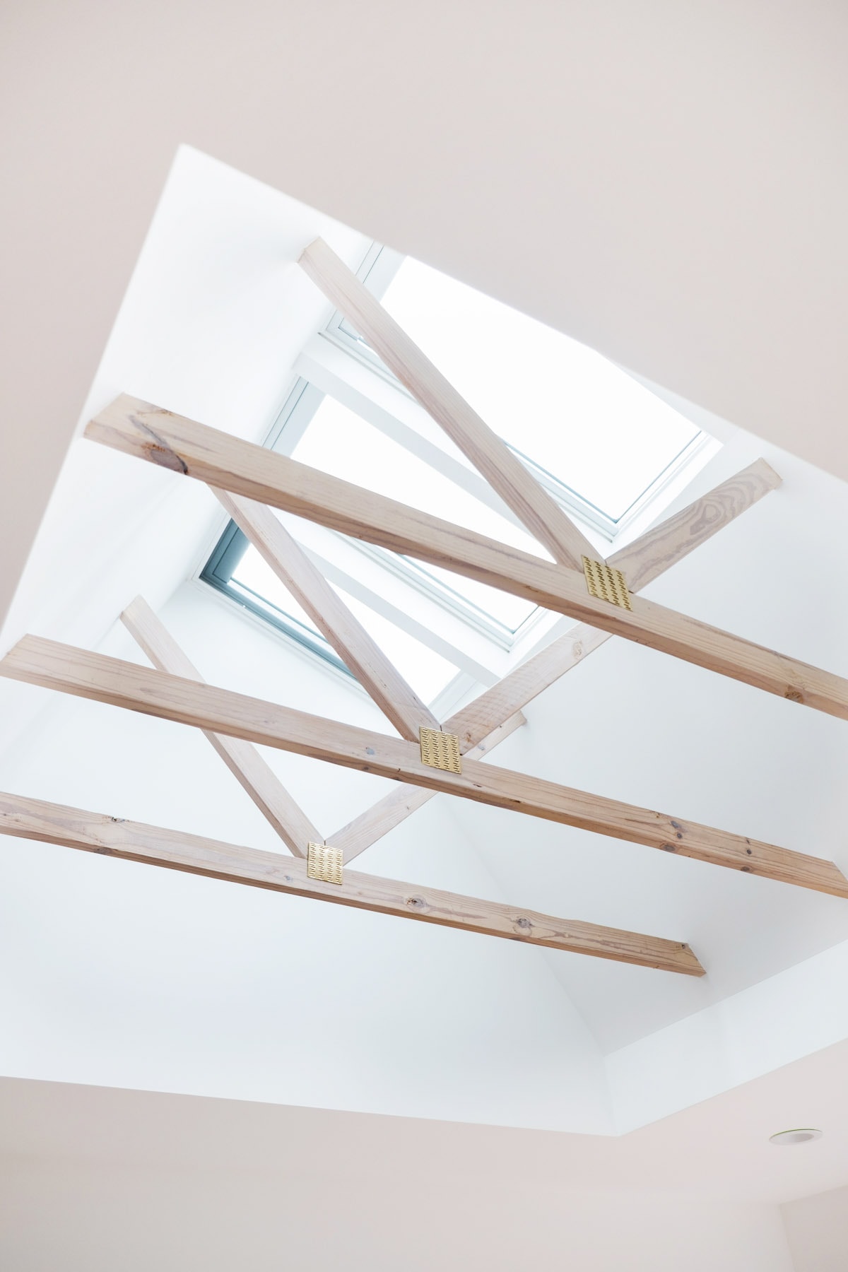 The whitewashed beams in the master bedroom - Sugar & Cloth Casa: Before & After of Installing Skylights in The New House