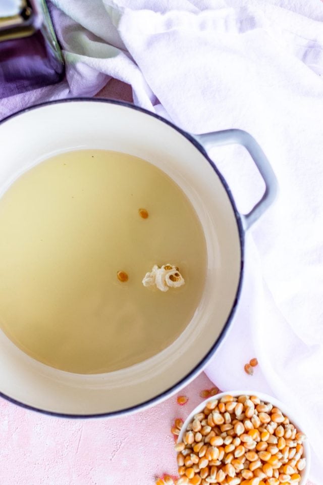 photo of popping popcorn is a stovetop cooker by sugar and cloth 