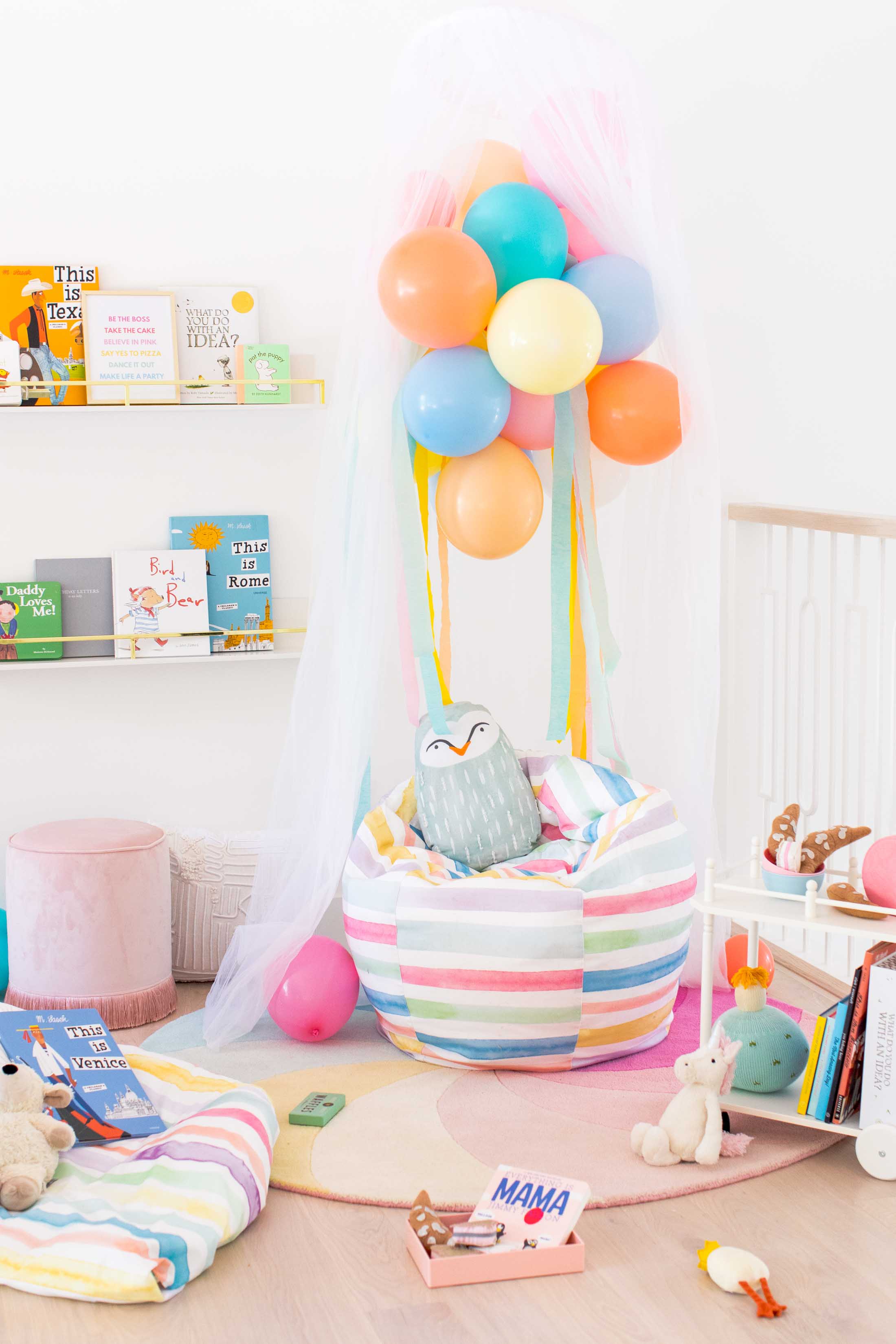 Sharing how to make this DIY book nook with a few colorful reading nook ideas to make it your own! #decor #kids #diy #reading by top Houston lifestyle blogger Ashley Rose of Sugar & Cloth