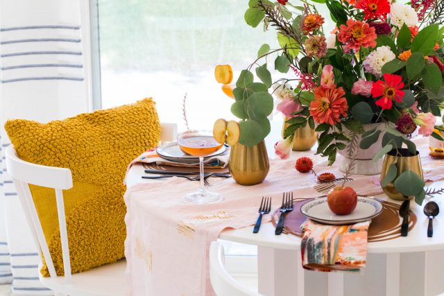 horizontal photo of a DIY table runner and fall table decor setting