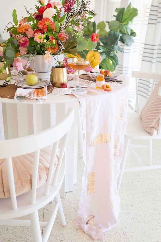 a styled dinner table using the DIY table runner