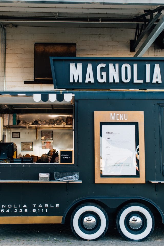 order food from the Take Away if you can't get a seat at the Magnolia Table restaurant from our for Texas Monthly guide 