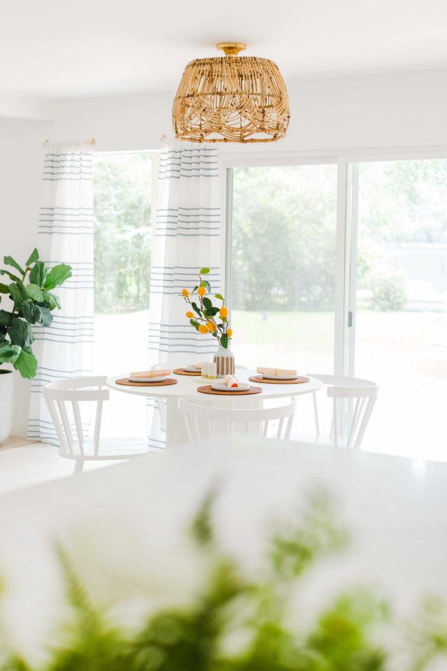 a picture of the finished DIY basket pendant light from the kitchen view by Sugar & Cloth