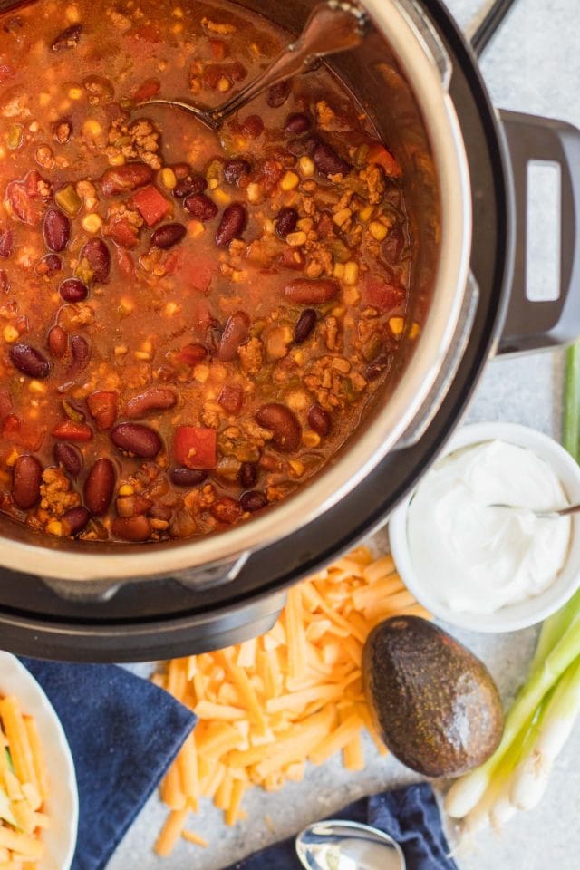 photo of the Best Easy Turkey Chili Recipe cooking in an Instant Pot by top Houston lifestyle blogger Ashley Rose of Sugar & Cloth