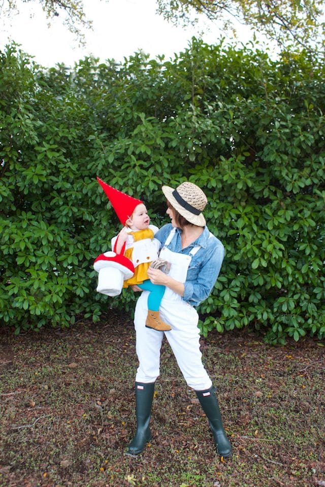 Photo of mother and toddler dressed as gardener and gnome Halloween costumes