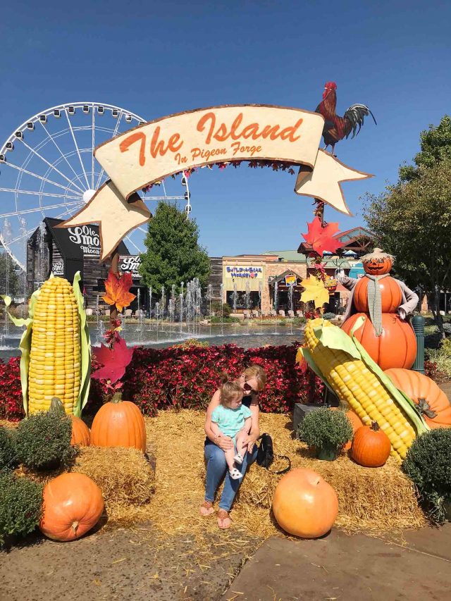 photo of a girl and grandma in pigeon forge with pumpkins
