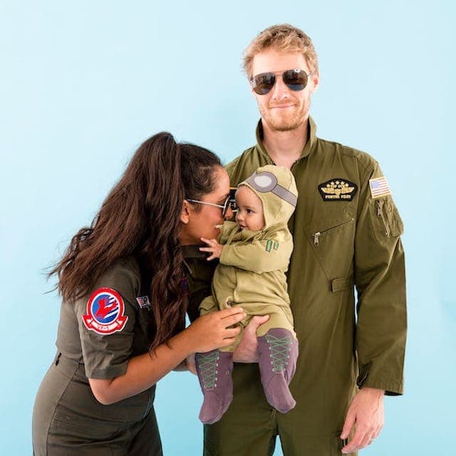 Photo of parents and baby in Top Gun Halloween costumes