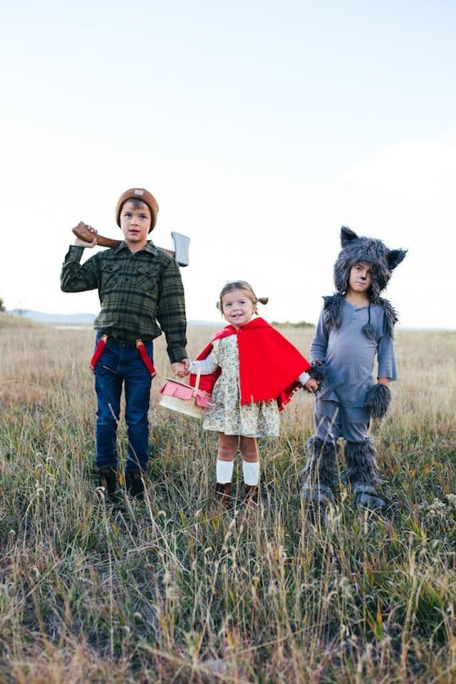 Photo of 3 siblings in Little Red Riding Hood inspired Halloween costumes