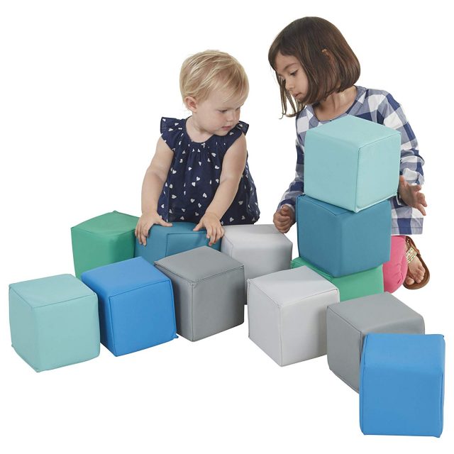 photo of two little girls playing with soft 1ft building cubes