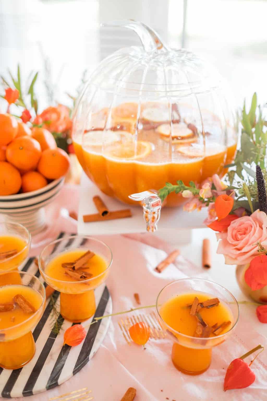 photo of a thanksgiving punch in a pumpkin punch bowl