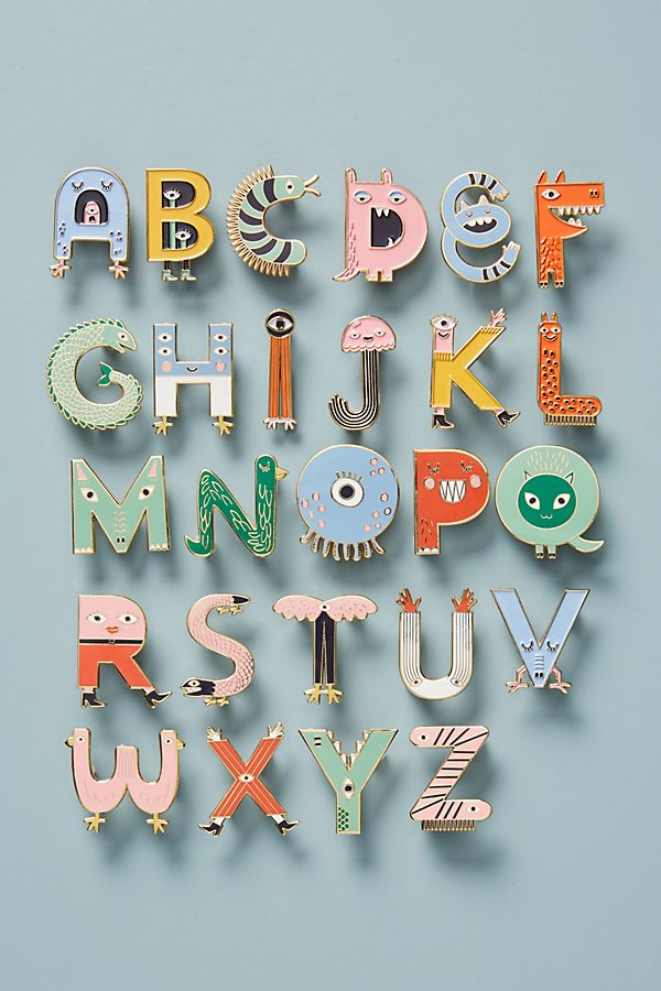 photo of set of alphabet wearable pins