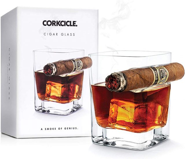 photo of a whiskey glass with a built in cigar holder