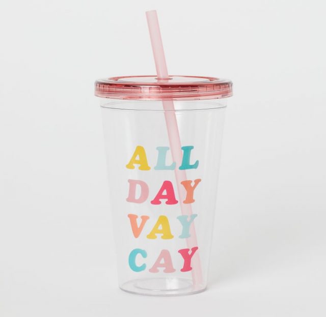 photo of a plastic tumbler with text