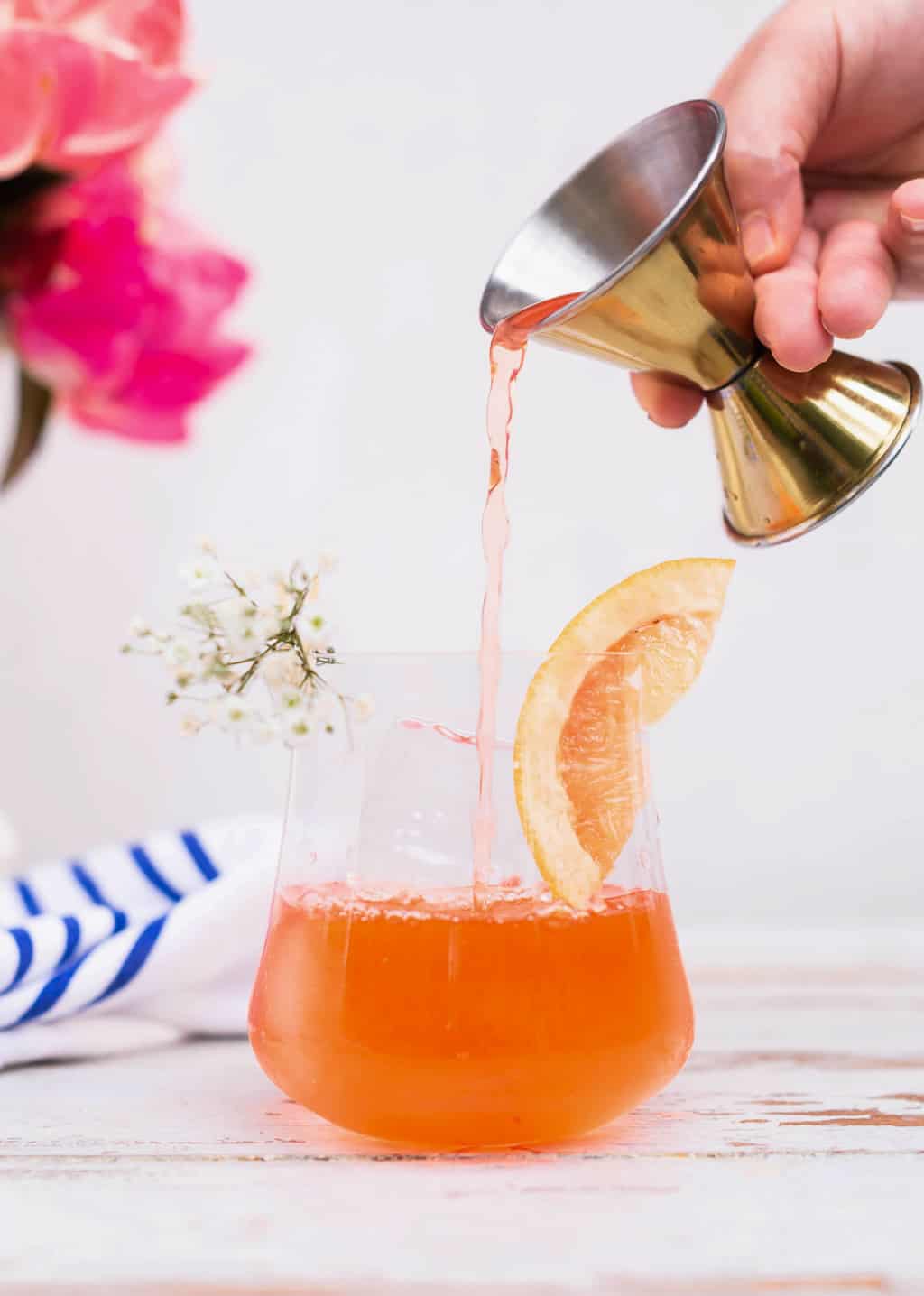 photo of How To Make An Elderflower Aperol Spritz Cocktail by top Houston lifestyle blogger Ashley Rose of Sugar & Cloth