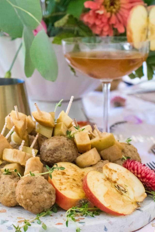 photo of the easy meatballs recipes garnished with apple slices by top Houston lifestyle blogger Ashley Rose of Sugar & Cloth