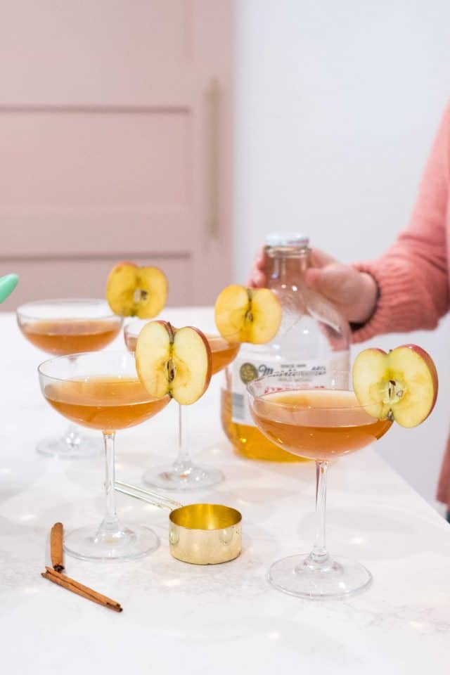 photo of Ashley of Sugar and Cloth prepping the apple cider vinegar drink by top Houston lifestyle blogger Ashley Rose of Sugar & Cloth