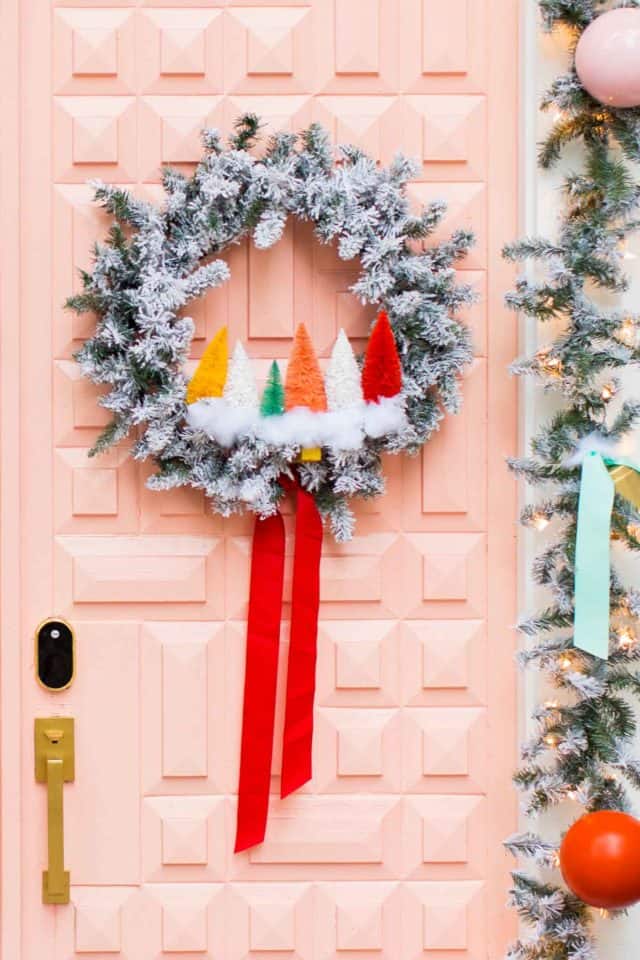 Christmas wreath on a pink front door
