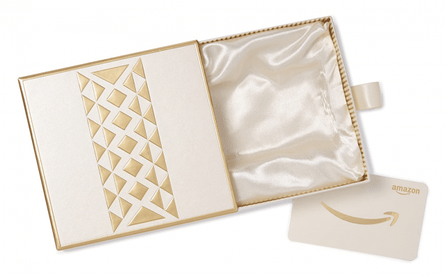 a white and gold amazon gift box with gift card idea