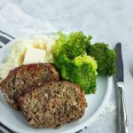 photo of the best easy meatloaf with a side of mash potatoes and broccoli by top Houston lifestyle blogger Ashley Rose of Sugar & Cloth