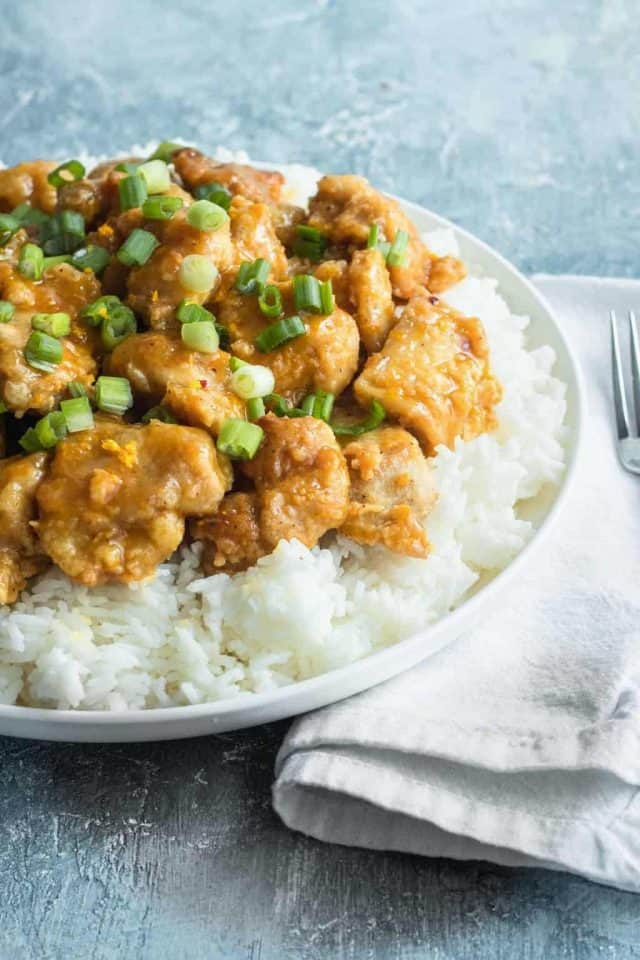 photo of the easy orange chicken up close by top Houston lifestyle blogger Ashley Rose of Sugar & Cloth