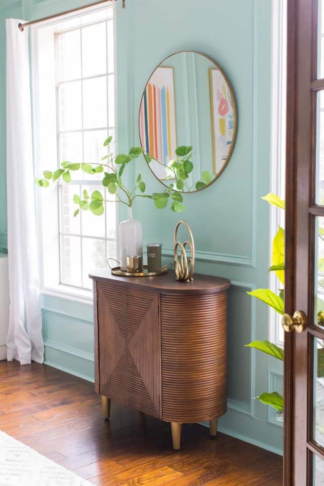 wooden credenza with windows